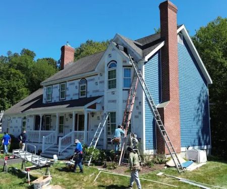 Rubman Construction LLC Roofing & Siding Service