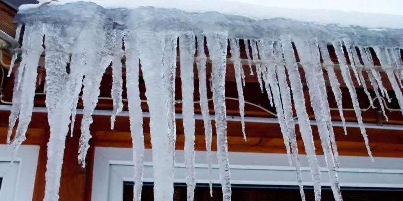 How to Maintain Roof Valleys and Downspouts to Prevent Ice Dams