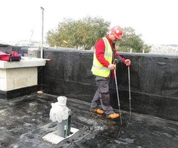 How to Water Test Your Roof to Find the Source of a Leak