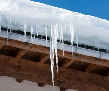 How to Fix a Roof Leak Caused by Ice Dams | BeachCo Roofing Hub