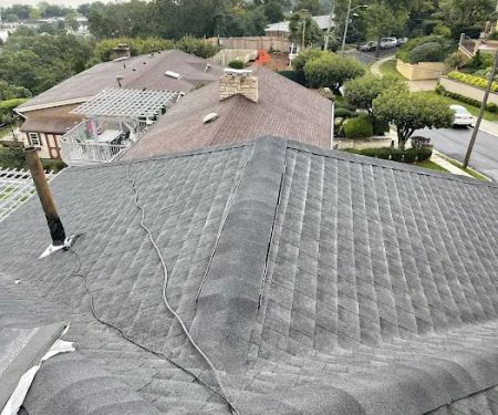 OMP ROOFING & SIDING LLC