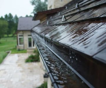 How to Prevent Roof Damage from Overflowing Gutters During Heavy Rain