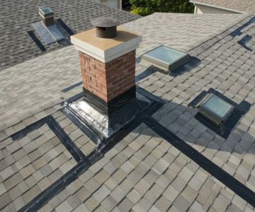 How to Install Roof Flashing on a Roof with Multiple Skylights and Penetrations | BeachCo Roofing Hub
