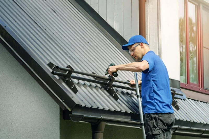 How to Properly Install Roof Snow Fences to Prevent Drifting