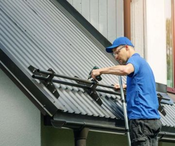How to Properly Install Roof Snow Fences to Prevent Drifting