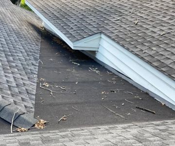 How to Install a Roof Cricket on a Built-Up Roof (BUR) System