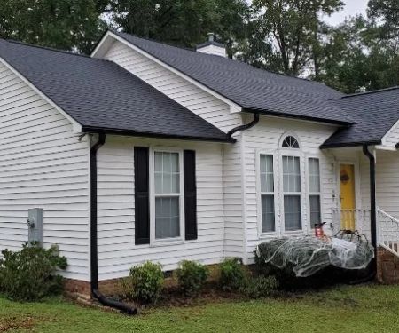 The Pros and Cons of a Black Roof vs. a White Roof