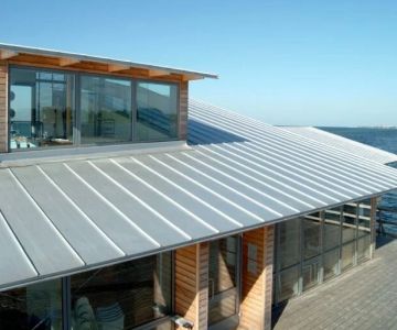 The Cost of a Roof Replacement with a Titanium Zinc Standing Seam Metal Roof - BeachCo Roofing Hub