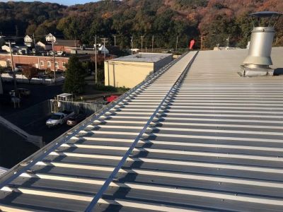 How to Install Roof Snow Guards on a Metal Roof