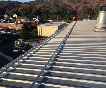 How to Install Roof Snow Guards on a Metal Roof