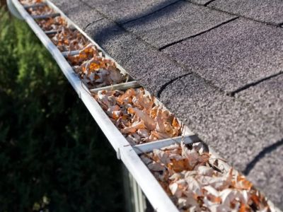 How to Prevent Roof Damage from Clogged Gutters and Downspouts