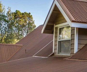 Metal Roof Cost per Square in 2026: Standing Seam vs. Corrugated Panels