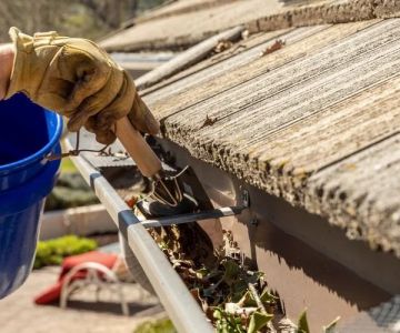 How to Clean Gutters on a Two-Story House Safely Without a Ladder
