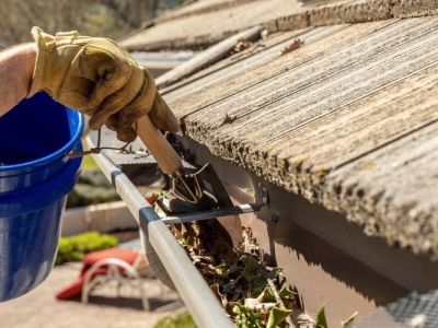 How to Clean Gutters on a Two-Story House Safely Without a Ladder